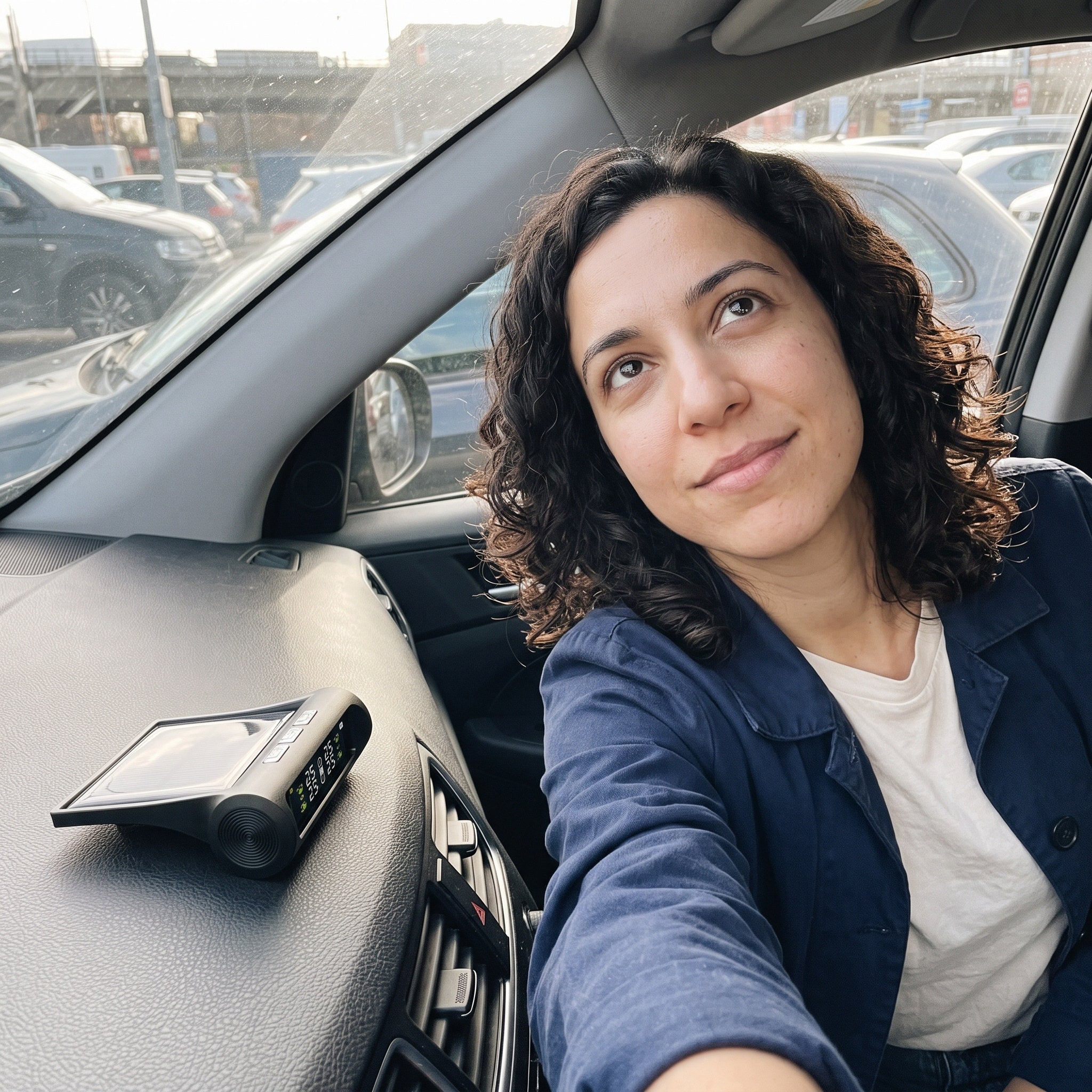 Sophie takes a parked-car cabin selfie before a longer drive